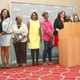 NABJ President Sarah J. Glover, at lectern, with the association's new board of directors after the August election
Gabriella Angotti-Jones/NABJ Monitor